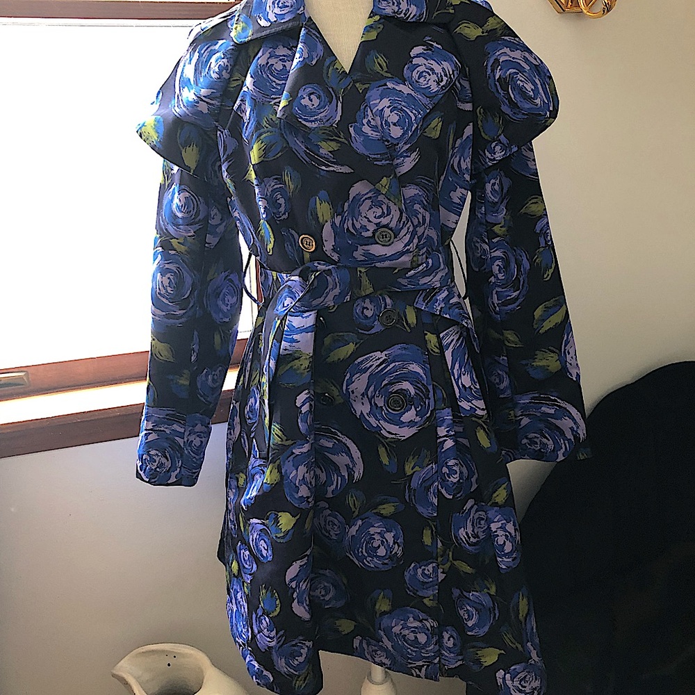 Floral trench coat with small dress flare.